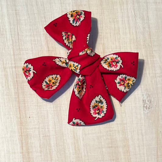 Red floral leaves bow
