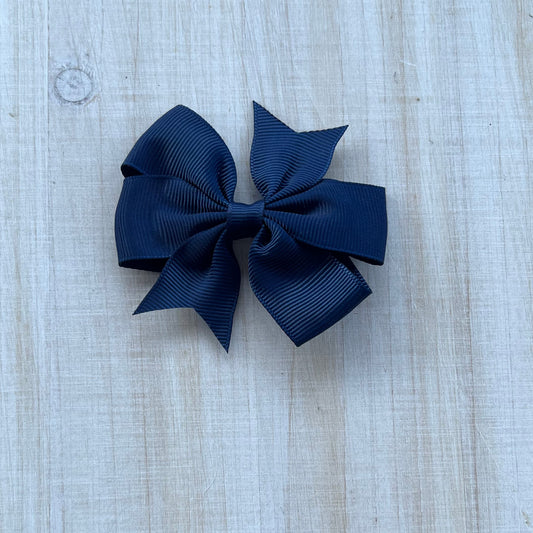 Navy blue pinwheel bow
