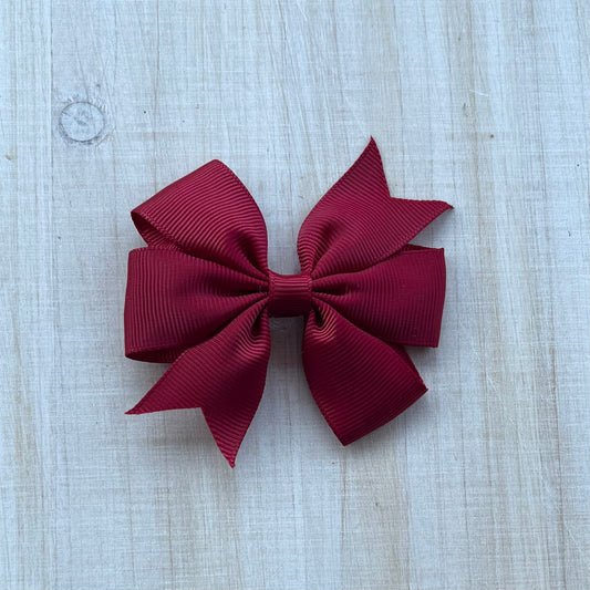 Crimson pinwheel bow